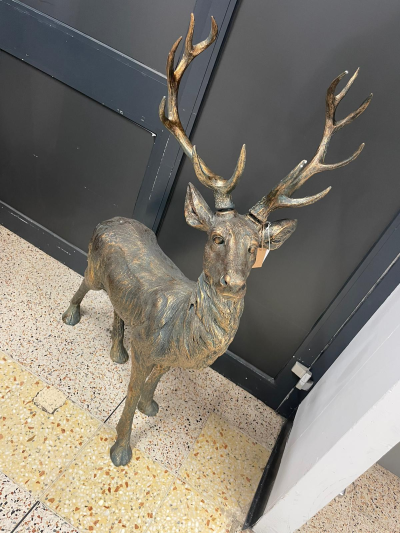 4ft Tall Reindeer - A luxurious 4ft golden reindeer Christmas decoration, featuring smooth sculpted details and elegant arched antlers. The perfect festive statement piece to add glamour and seasonal